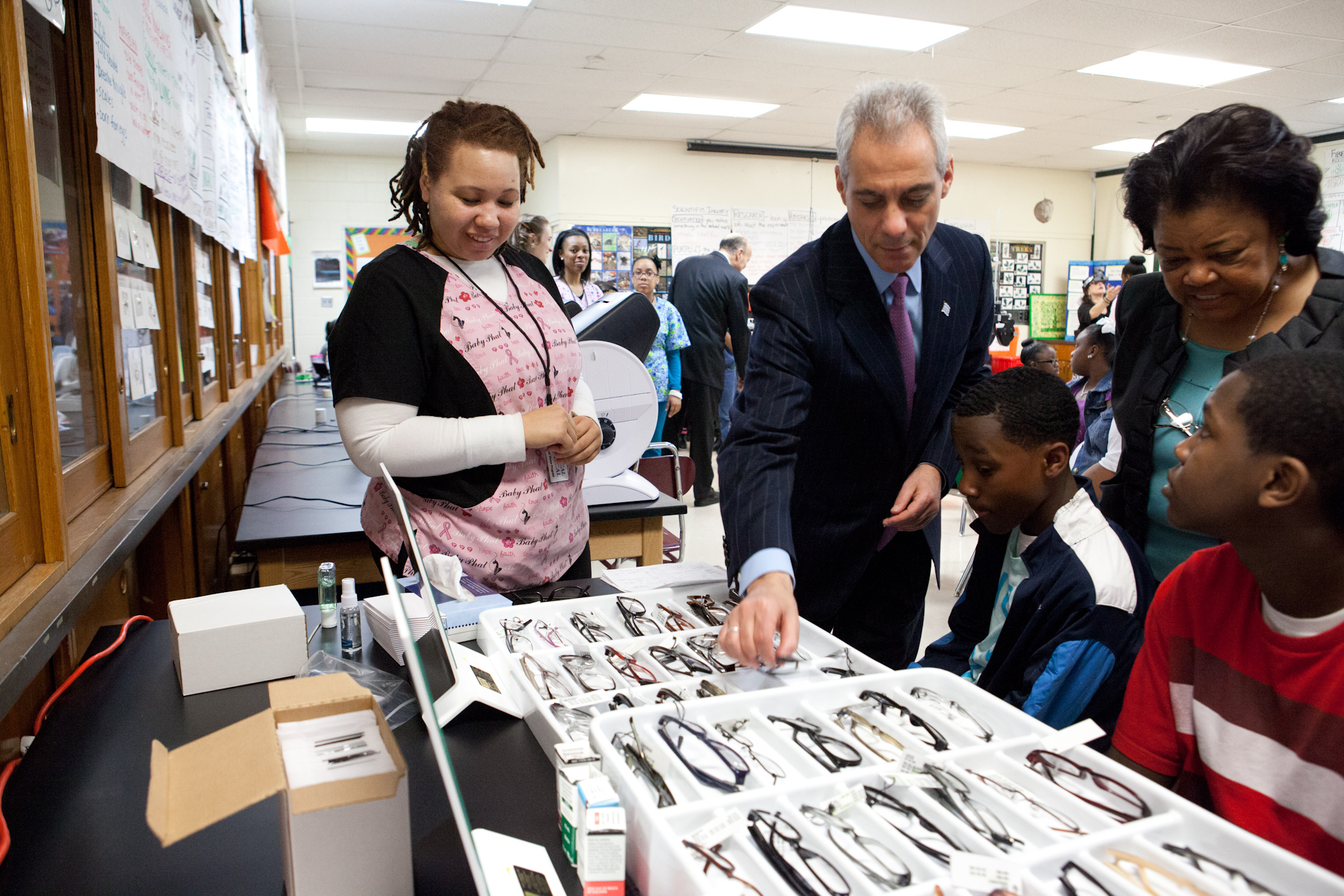 Mayor Emanuel visits with students receiving free vision exams at Sumner Elementary school